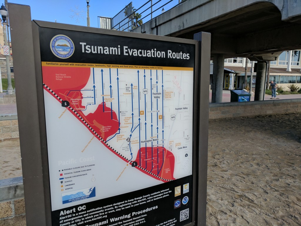 Kiosk of Huntington Beach's TsunamiClear map located on the beach.